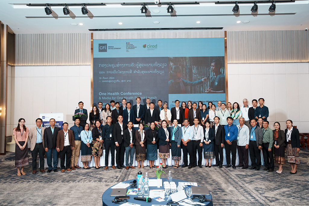 The 13 Laotian journalists with speakers and participants at the “Media for One Health” launch event.